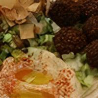 Falafel Platter · Five crunchy homemade falafel balls. Served with hummus, fattoush salad, tahini sauce, pickl...