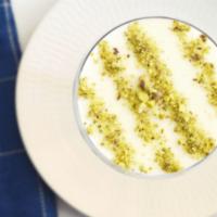Mahalbiyah · A sweet cream pudding topped with crushed pistachios.