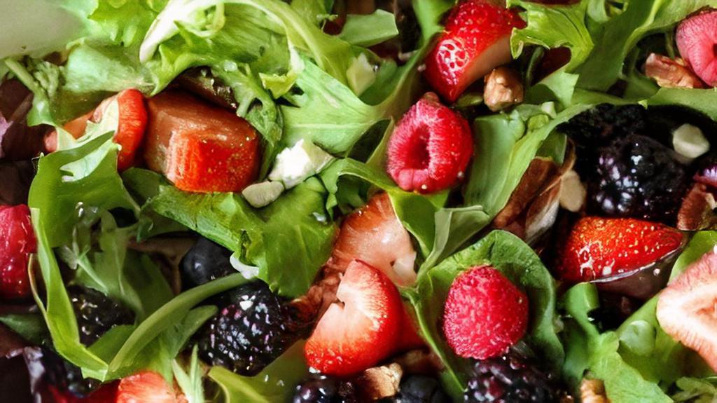 Nuts & Berry Salad · Walnuts, blue cheese, dried berries, red onion, and tomato with spring mix and raspberry vinaigrette