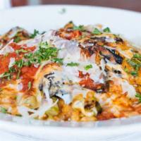 Grilled Vegetable Lasagna · The grilled assortment of vegetables layered with sweet potato risotto and roasted marinara ...