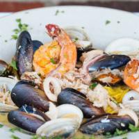Pescatore · Mussels, clams, calamari, shrimp, and lump crab, red or white over homemade pasta.