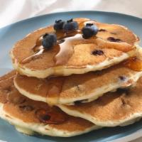 3 - Fresh Blueberry Pancake · Buttermilk pancakes Loaded with fresh blueberries.