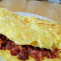 The Bacon Lovers Omelette · Loaded with bacon & Choice of cheese.
