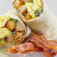 Breakfast Burrito · Peppers, Onions, Eggs, Meat, & Choice of cheese with home fries inside