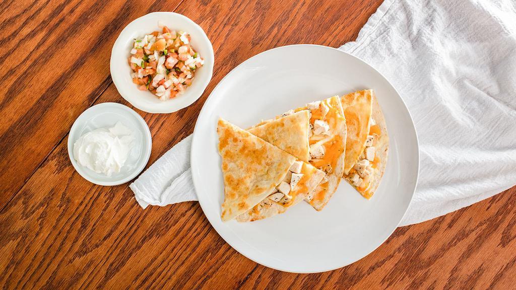 Quesadilla · Cheese, choice of meat (chicken or steak),