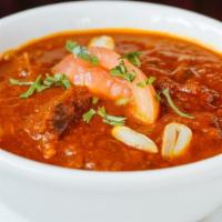 Lamb Curry · Tender lamb marinated and cooked in a curry sauce of fresh herbs and spice.