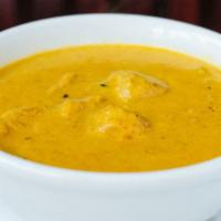 Chicken Shahi Korma · A Moghulai delight! Cardamoms flavored sweet and spicy curried chicken in cream , cashews, a...