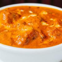 Paneer Tikka Masala · Homemade cottage cheese cubes cooked in clay oven with green peppers and onions in a rich cr...