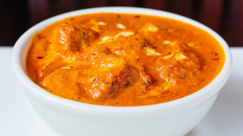 Paneer Tikka Masala · Homemade cottage cheese cubes cooked in clay oven with green peppers and onions in a rich creamy gravy.