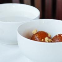 Gulab Jamun · A light fried cheese ball made of milk in sugar syrup.