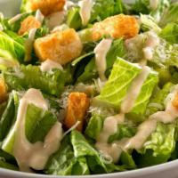 Caesar Salad · Romaine lettuce, house croutons, and parmesan cheese with Caesar dressing.