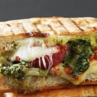 Grilled Chicken Pesto Panini · Grilled chicken breast with grilled peppers, basil pesto sauce and melted mozzarella cheese....