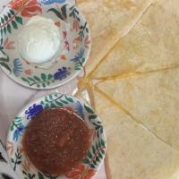 Cheese Only Quesadilla · 12-inch flour tortilla with Mexican cheese.. served with sour cream and salsa.