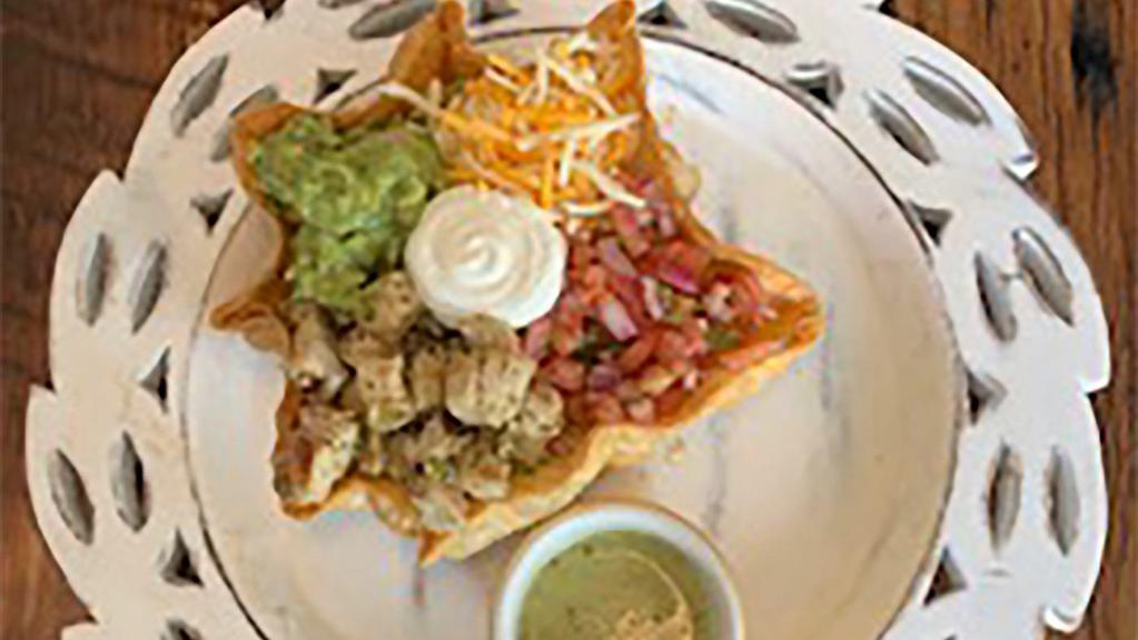 Taco Salad · Fried tortilla shell served with lettuce mix + one protein of your choice + pico de galo+ cheese +sour cream.