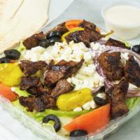 Steak Tip  · Grilled Marinated Steak Tip over the Garden Salad with choice of dressing and Pita bread.