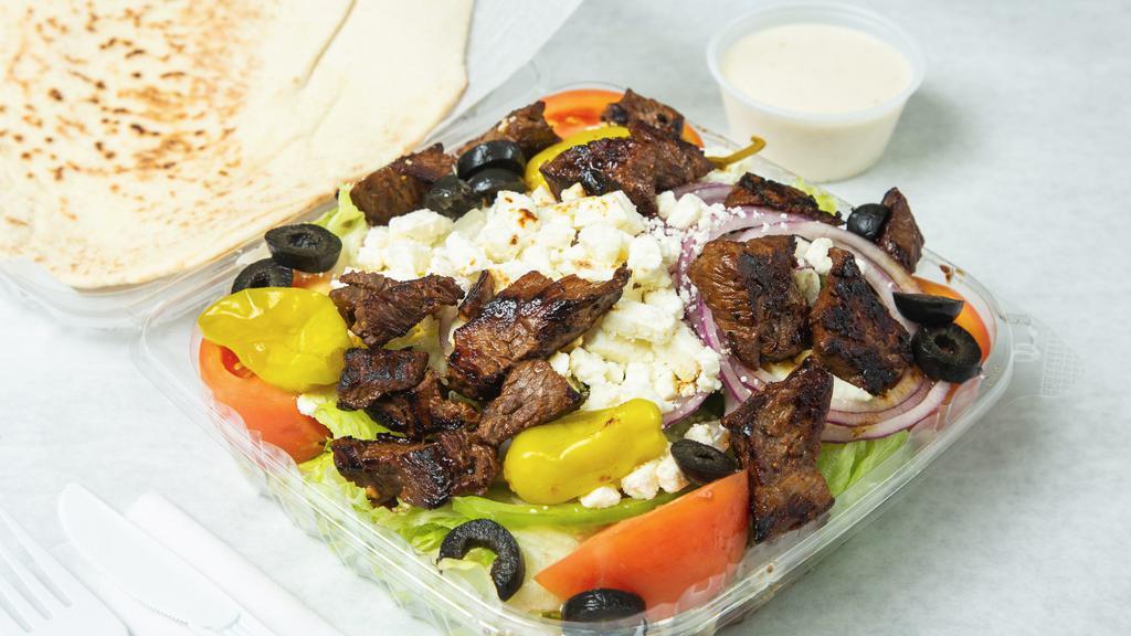 Steak Tip  · Grilled Marinated Steak Tip over the Garden Salad with choice of dressing and Pita bread.