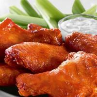 Buffalo Wings Or Wing Dings (10) · Served mild, hot, BBQ, sweet red chili or garlic parmesan with a side of blue cheese.
