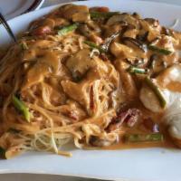 Abruzzi (With Chicken) · Sautéed in a shallot brandy cream sauce with fresh tomatoes, a touch of marinara, mushrooms ...