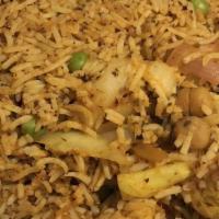 Vegetables Biryani · Basmati rice, India's thin, long-grained rice, cooked with layers of onions, ginger, exotic ...