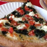 Spinach Florentine · Oven roasted spinach, diced tomatoes, mozzarella, ricotta and romano cheese.