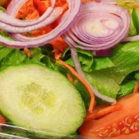 House Salad · Lettuce, tomato, cucumber, red onion, carrots, peppers, pepperoncini and olives.