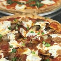 Meat Lover · Fresh tomato sauce, mozzarella, pecorino cheese, bacon, pepperoni, and sausage with scallions