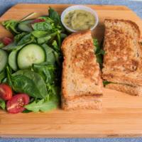 Avocado Grilled Cheese  · Avocado, spinach, tomato, swiss and American cheese, served on grilled whole wheat.
