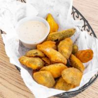 Jalapeño Poppers · Jalapeños stuffed with cream cheese and served with ranch dressing.