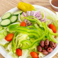 Garden Salad · Fresh onions, tomatoes, kalamata olives, green peppers and cucumber over lettuce with side h...