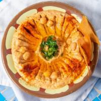 Hummus With Roasted Red Pepper · Vegan. Served with pita bread.