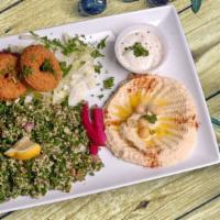 Falafel Platter · Vegetarian. Tabbouleh salad and hummus served with pita bread.