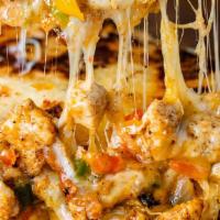 Chicken Quesadilla · Topped with Chicken and shredded cheese