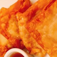 Crab Rangoon · Homemade wonton filled with cream cheese, imitation crab meat, chopped onion served with pin...