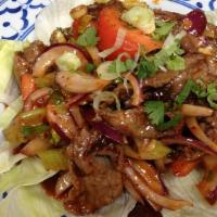 Yum Nua · Medium. Grilled sliced beef tossed with celery, cucumber, red onion, tomatoes, scallion in s...