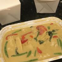 Green Curry · Gluten free. Medium.  Bamboo shoot,  string beans,  red and green pepper and basil leaves. G...