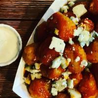 Hot Tots · Frank’s hot sauce, crumbled blue cheese and homemade ranch