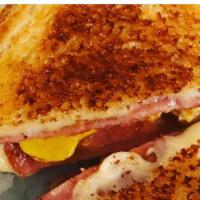 Breakfast Grilled Cheese · White bread, American cheese, a fried egg and your choice of pork roll, bacon or tomato.
