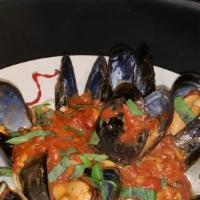 Fresh Maine Mussels · Sautéed mussels in garlic and olive oil red or white.