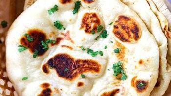 Garlic & Cheese Naan · Stuffed with mozzarella cheese and topped with minced garlic.