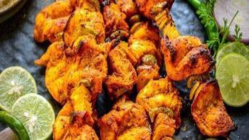 Chicken Tikka · Boneless chicken marinated in herbs and spices charbroiled to perfection.