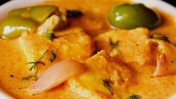 Paneer Tikka Masala · Homemade cottage cheese cubes cooked in clay oven with green peppers and onions in a rich creamy gravy.