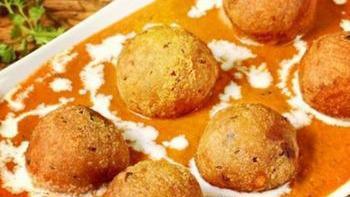 Malai Kofta · Tender homemade cheese dumplings stuffed with raisins and nuts then simmered in a saffron an...