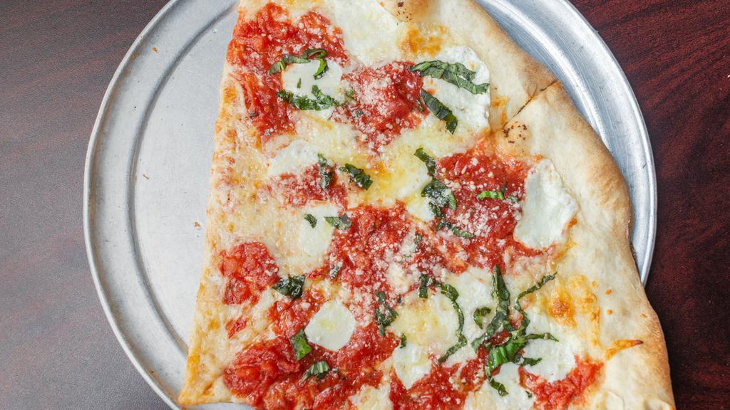 Margherita Pizza · Plum tomatoes, fresh mozzarella and fresh basil. Large 16