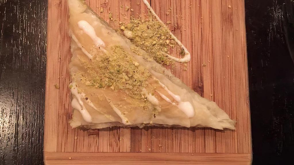Baklava · A Lebanese delicacy, layers of very fine dough stuffed with cashews with caramel, pistachios with honey, nutella hazel nuts or walnuts and cinnamon.