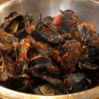 Cozze In Rosso · Fresh mussels steamed in a white or red sauce.
