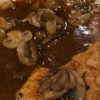 Chicken Marsala · Breast of chicken with mushrooms cooked in a Marsala wine sauce.