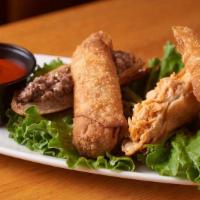 Philly Cheesesteak Eggrolls · Extra lean shaved steak and American cheese in a crispy egg roll wrapper served with a spicy...