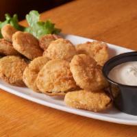 Fried Pickles · Sliced kosher dills lightly coated in our special breading and deep fried served with a hors...