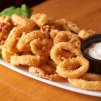 Rhode Island Style Calamari · Golden fried and served with cherry peppers and cajun sauce.