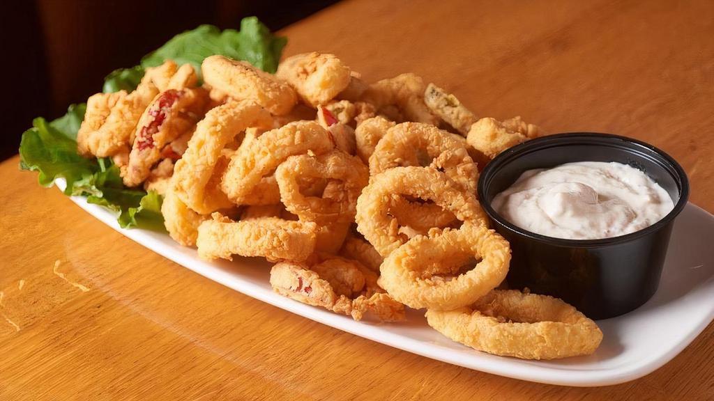Rhode Island Style Calamari · Golden fried and served with cherry peppers and cajun sauce.